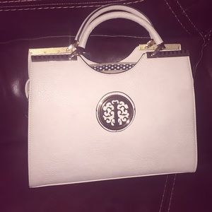 Lisa fang white purse with gold detailing